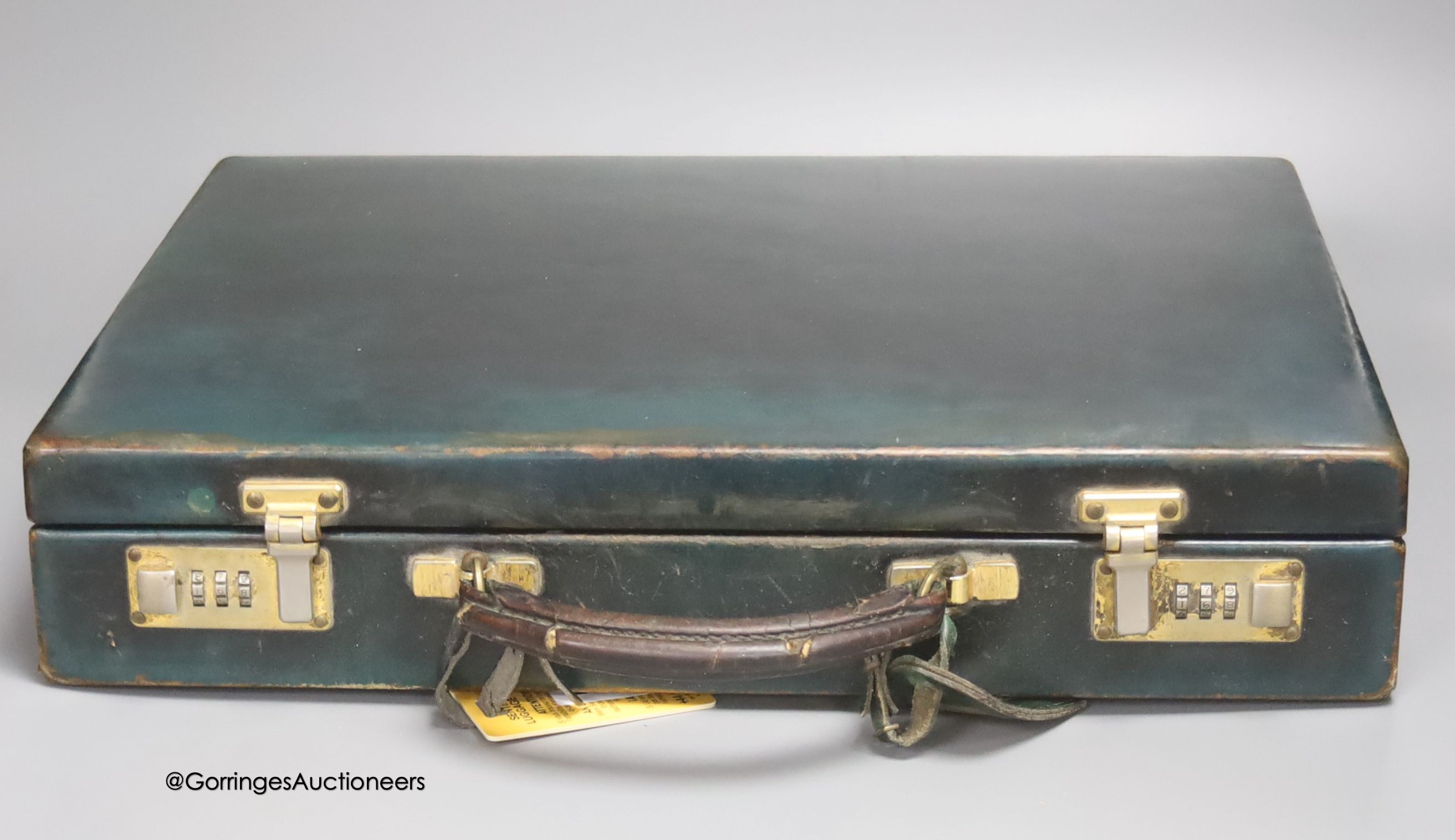 An Asprey 'James Bond' green leather briefcase, with combination lock, width 42cm